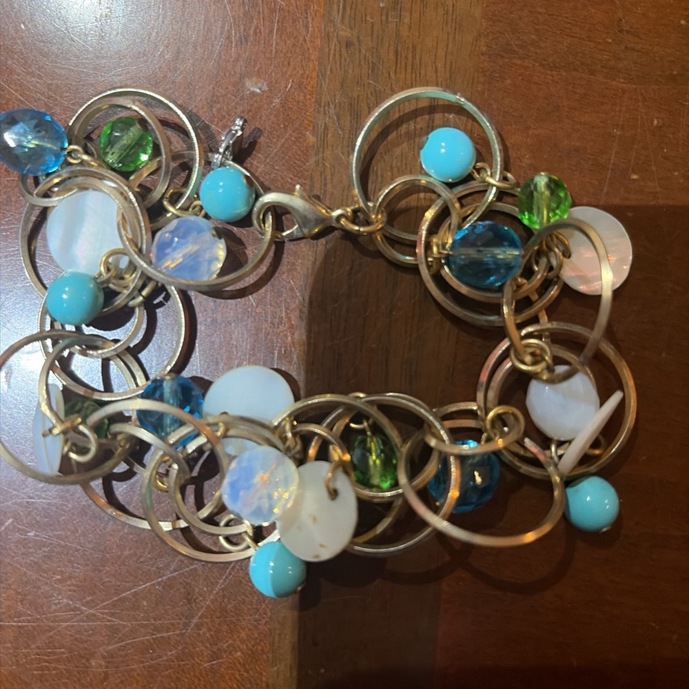 Elegant Gold and Blue Charm Bracelet